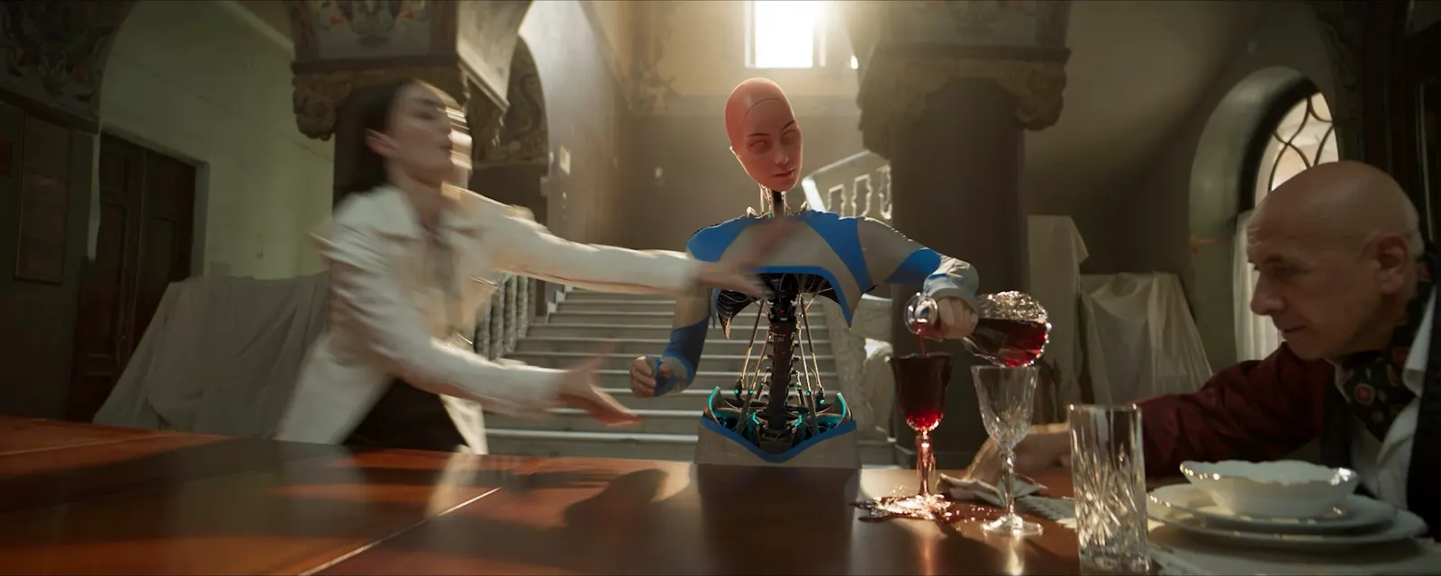CG robot character integrated into a live-action dinner scene
